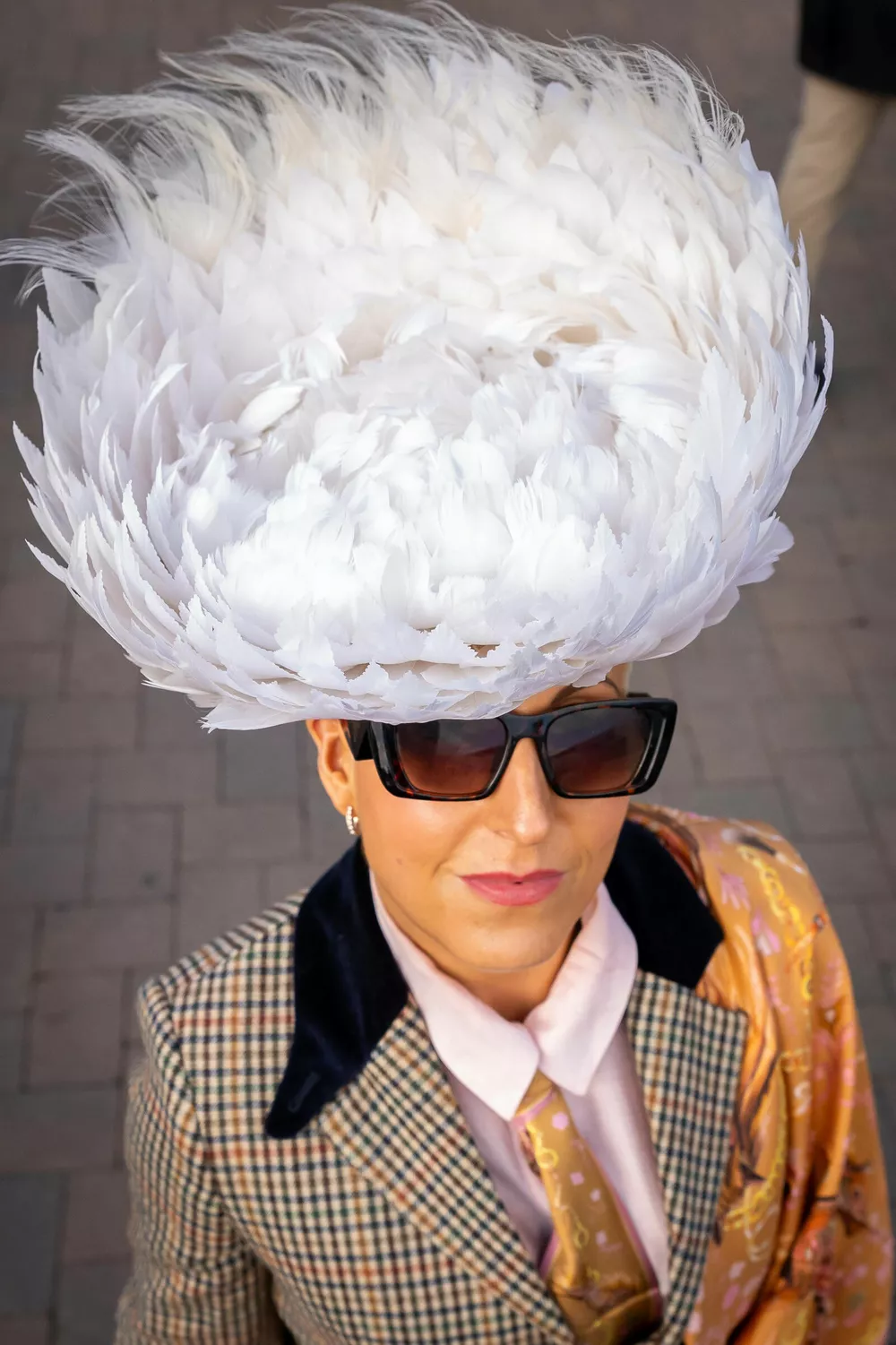 Королева Камилла, мама Кейт Миддлтон и Зара Тиндалл с мужем: наряды знатных дам на ежегодном фестивале в Челтнеме