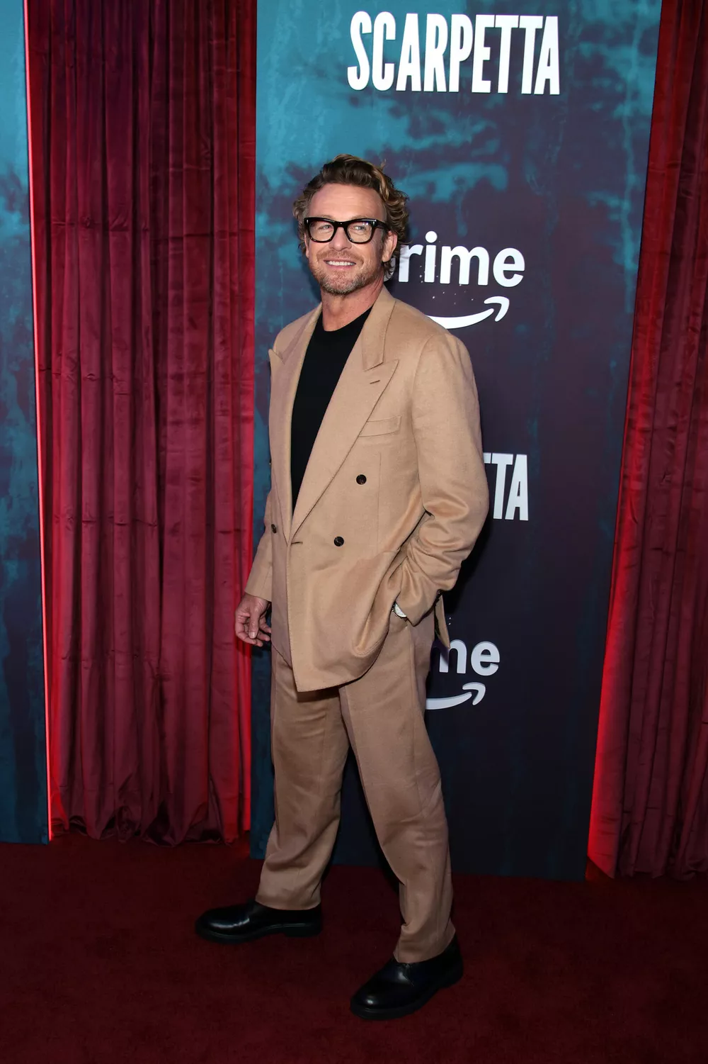 Саймон Бейкер