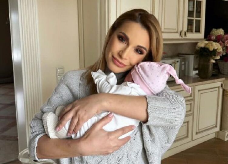 Olga Orlova baptized her daughter and showed her face
