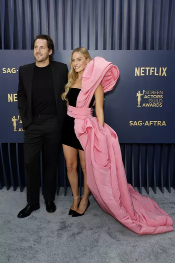 Марго Робби и Том Акерли