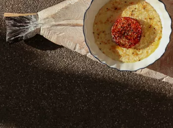 Пшенная каша с пармезаном и томатом из печи